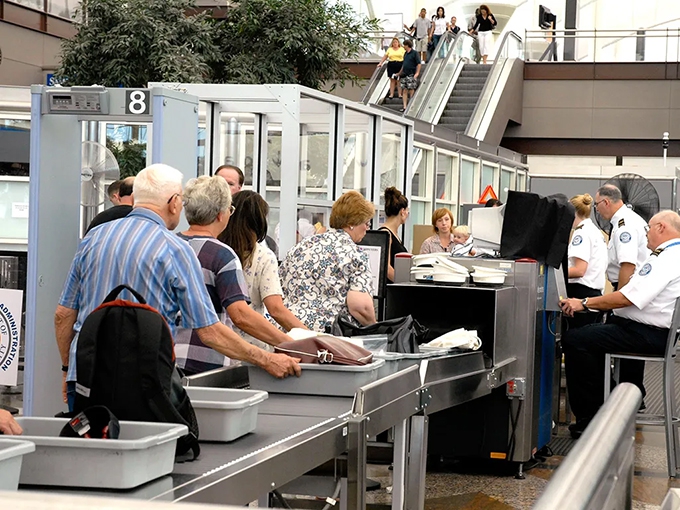 Why do I have to take my laptop out of the bag at airport security?