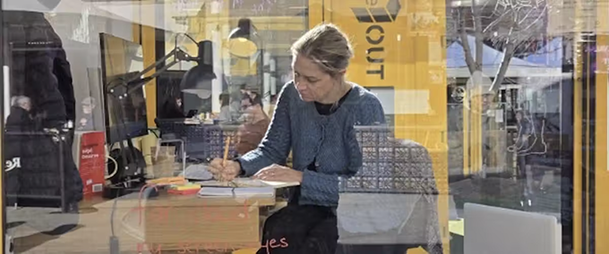 We spent a month writing and reading in glass boxes. We read faster, wrote more – and inspired passersby