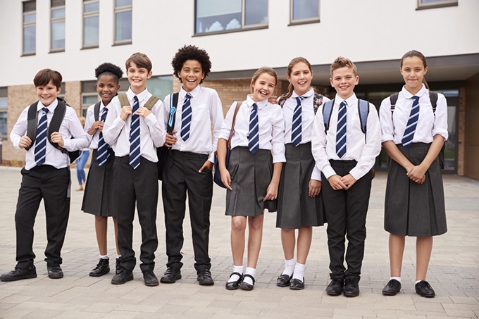 School uniforms are meant to foster a sense of belonging and raise achievement – but it’s not clear that they do